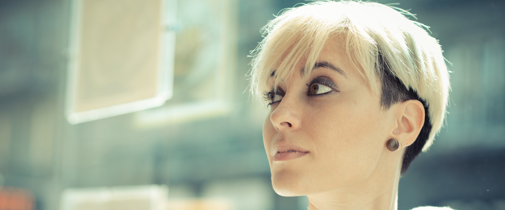 beautiful young blonde short hair hipster woman